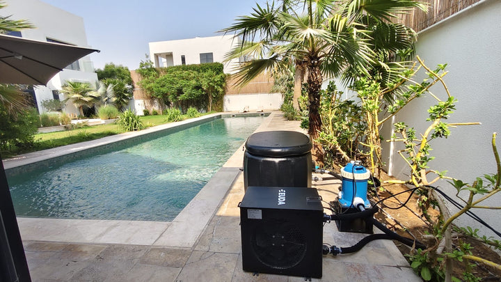 Ice bath with insulated lid and EUDA chiller installed beside a villa pool in Dubai