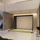 Golf simulator enclosure angled view with hitting mat